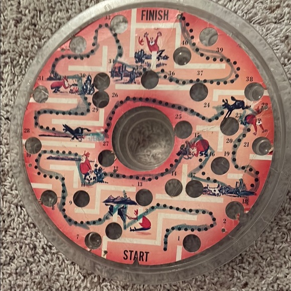 Vintage Circular marble maze game with Red and Black Design